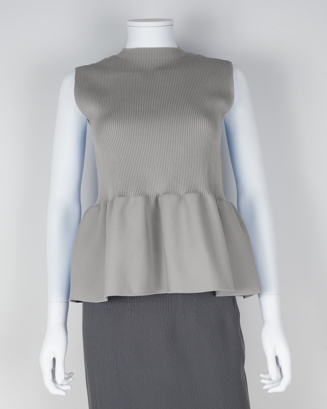 sleeveless peplum pullover