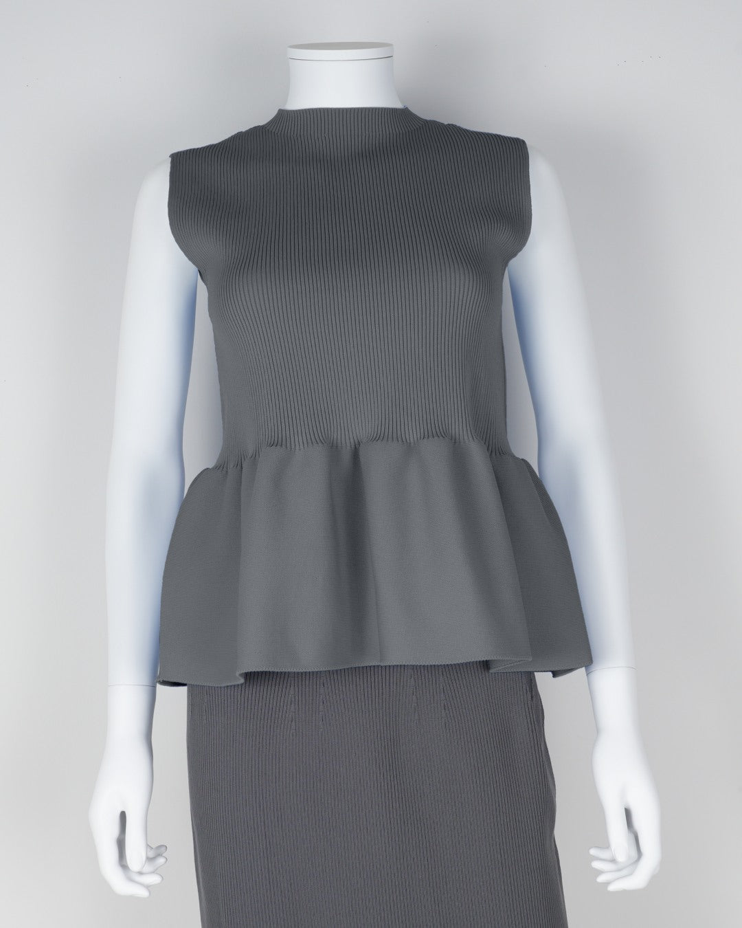 sleeveless peplum pullover