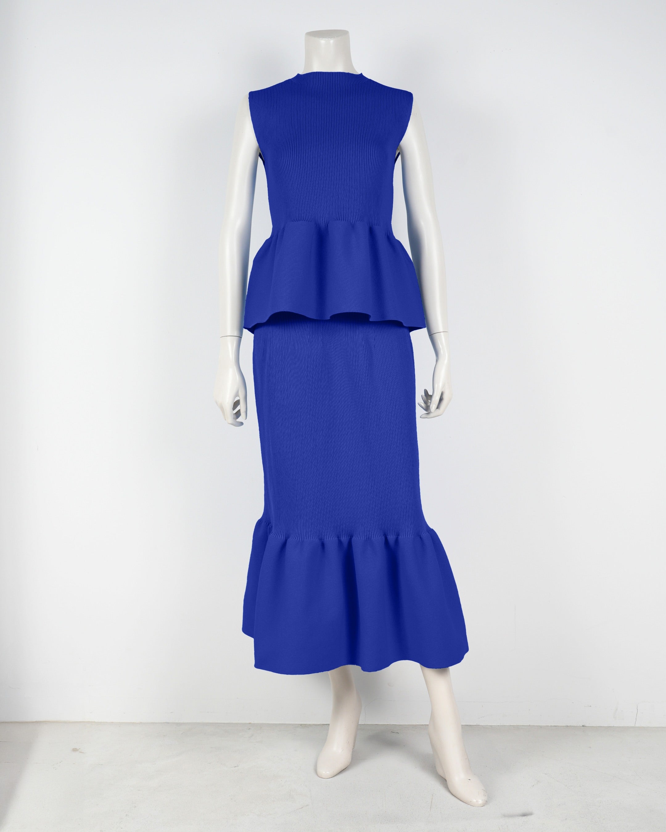 Sleeveless peplum pullover x mermaid skirt