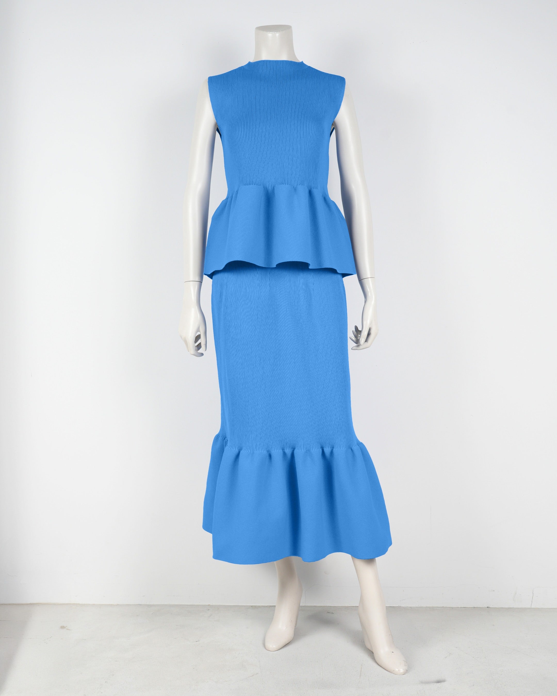 Sleeveless peplum pullover x mermaid skirt