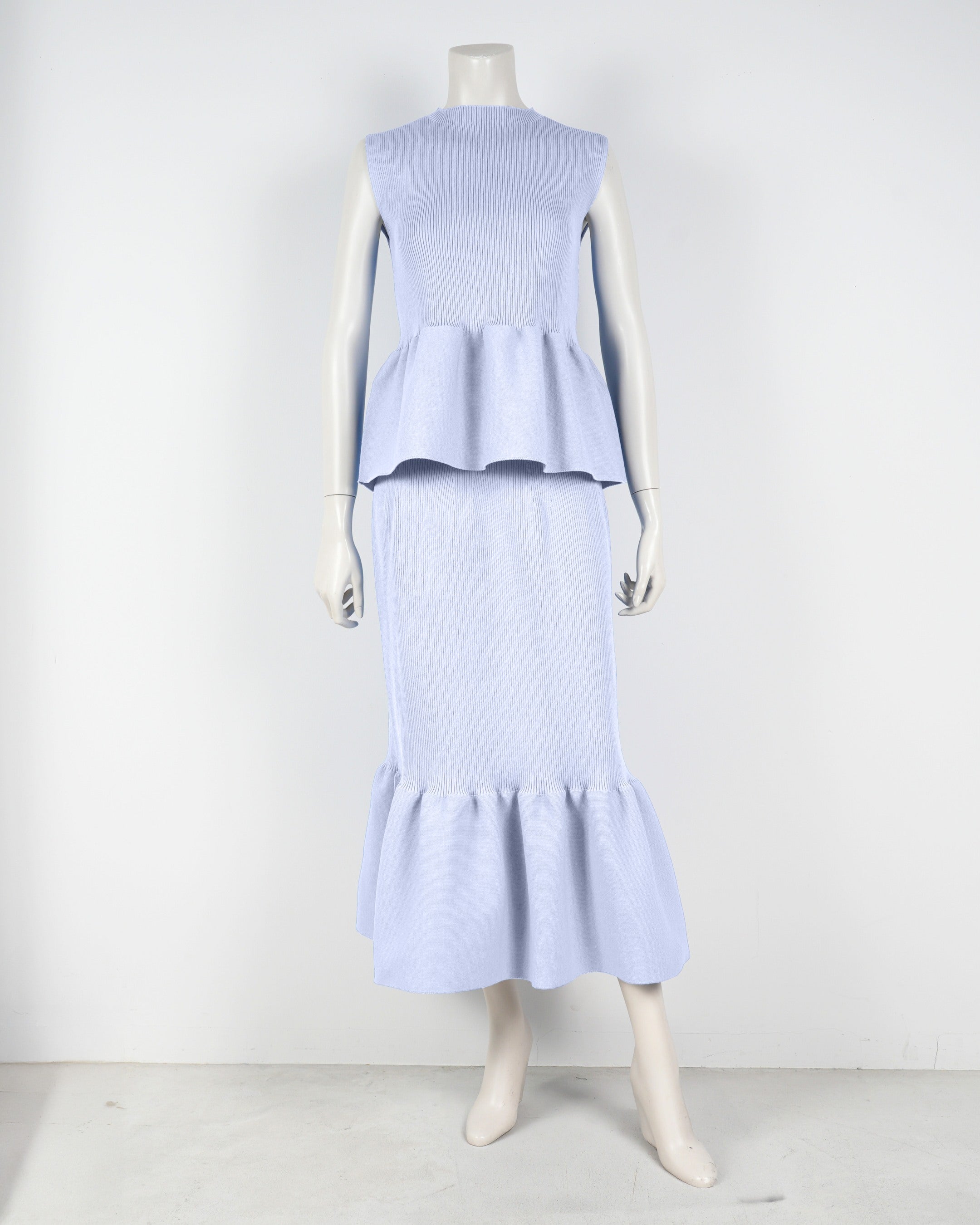 Sleeveless peplum pullover x mermaid skirt