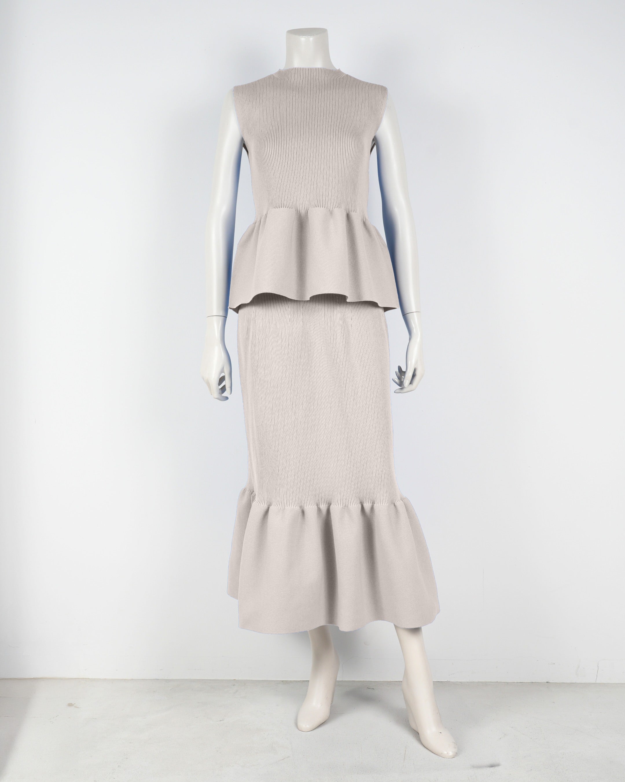 Sleeveless peplum pullover x mermaid skirt