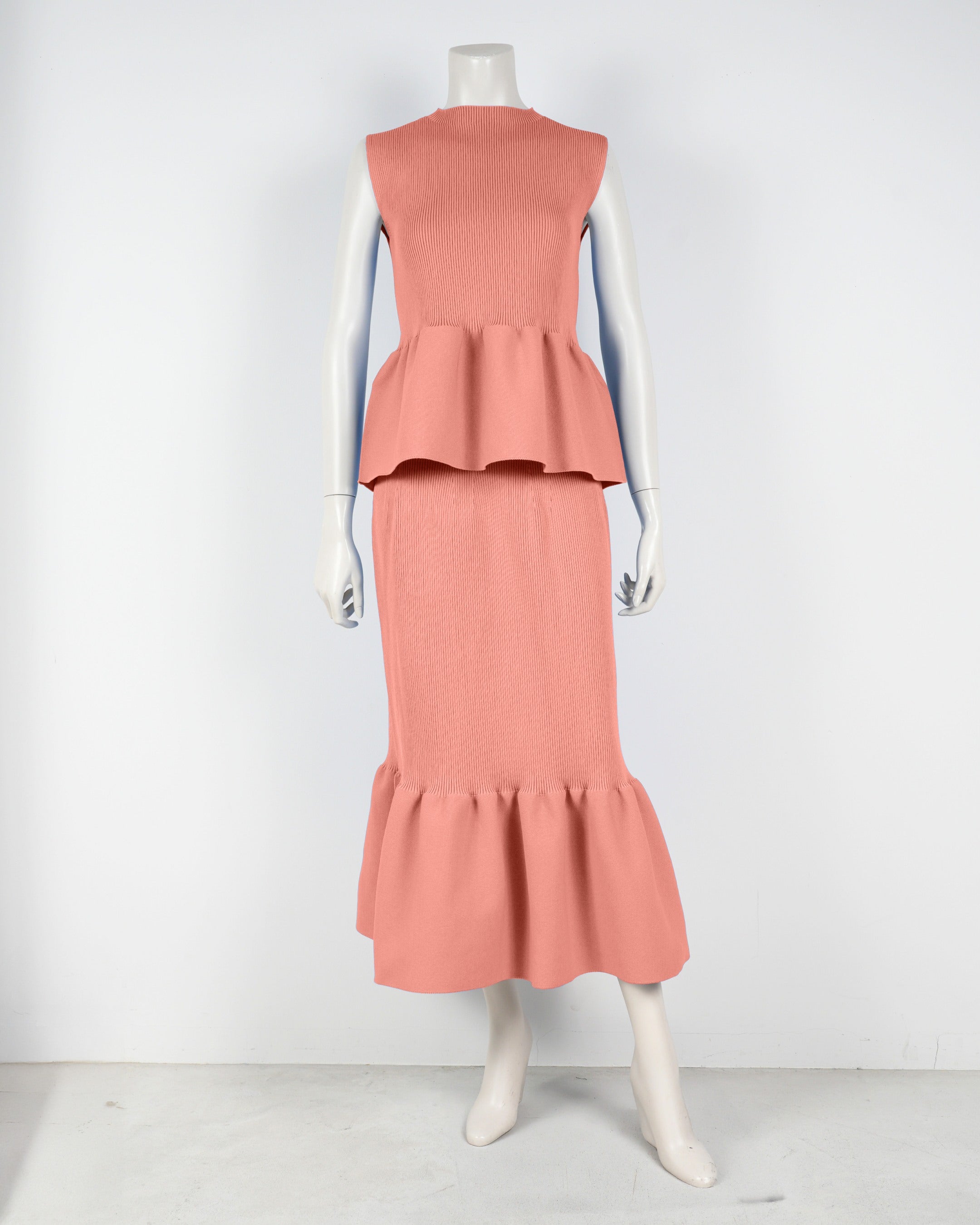 Sleeveless peplum pullover x mermaid skirt