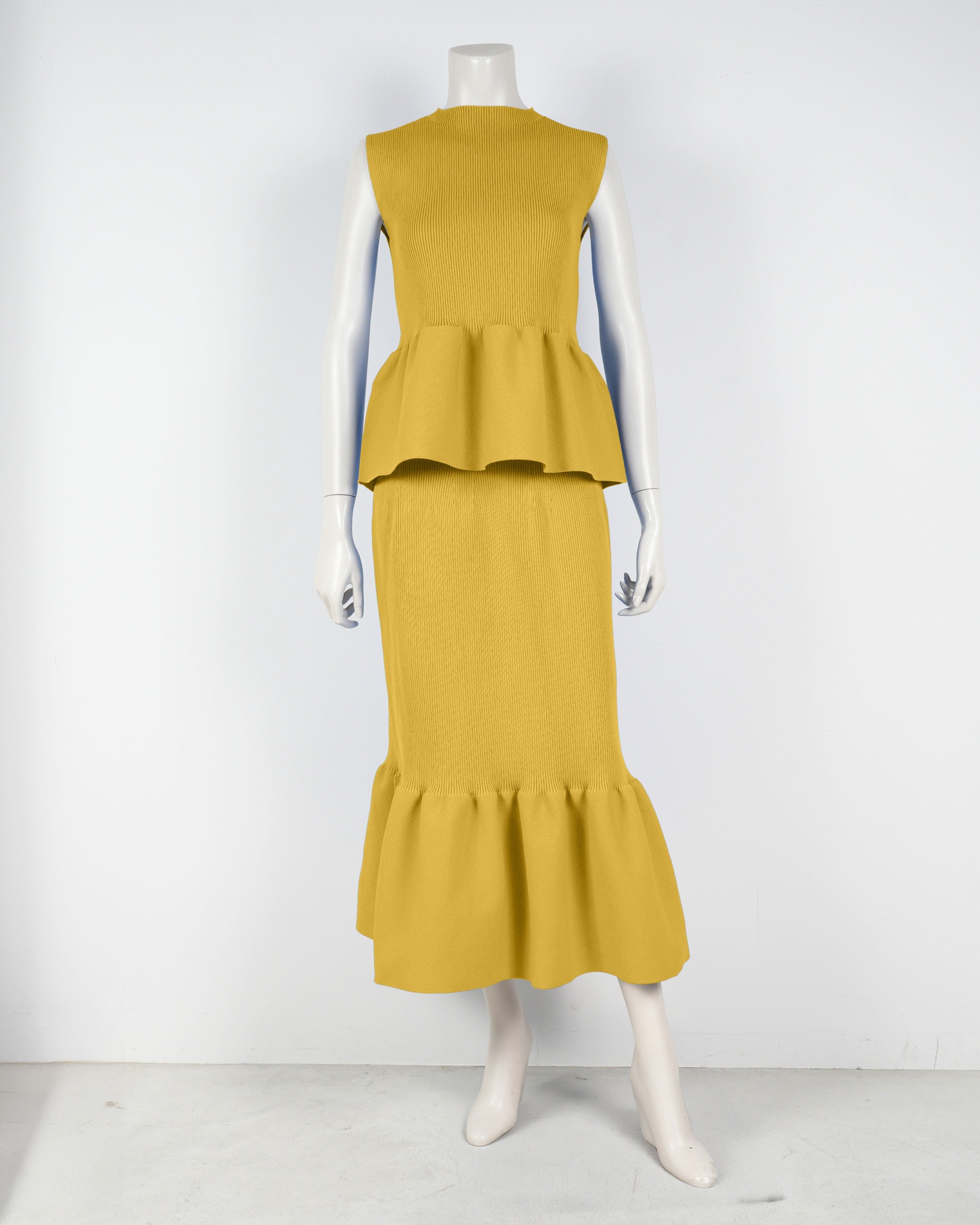 Sleeveless peplum pullover x mermaid skirt