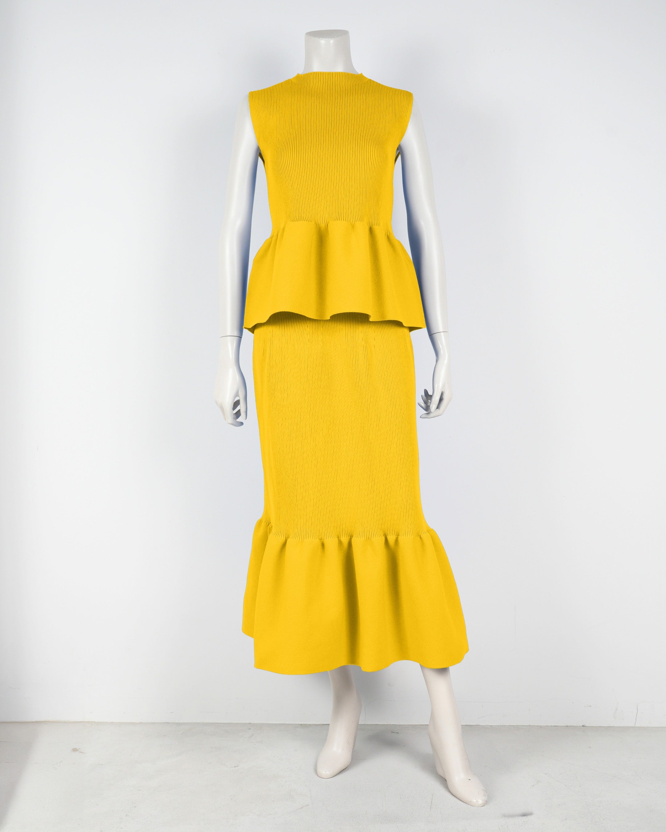 Sleeveless peplum pullover x mermaid skirt