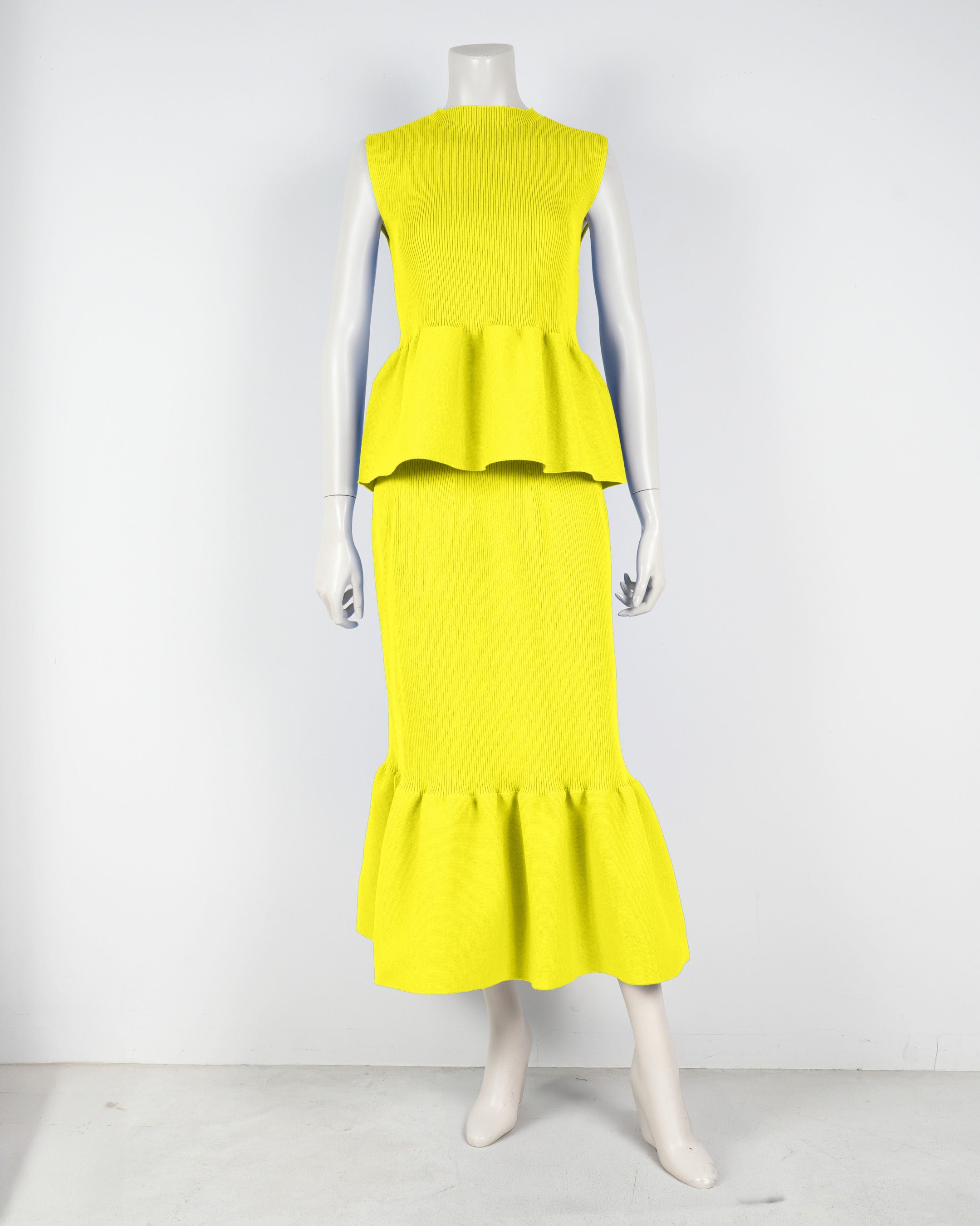 Sleeveless peplum pullover x mermaid skirt