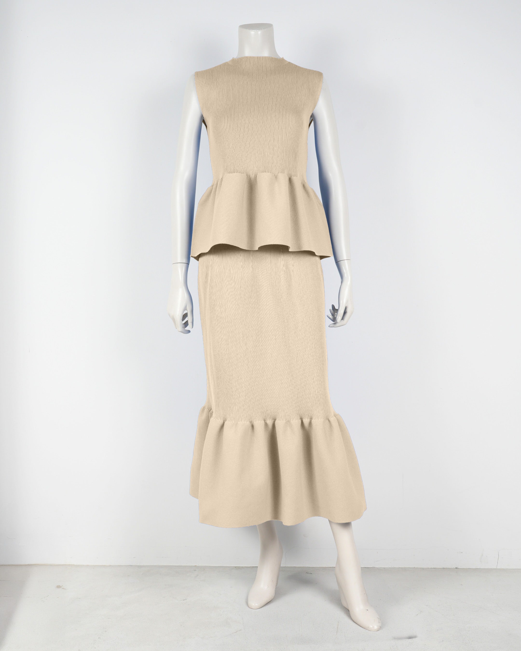 Sleeveless peplum pullover x mermaid skirt