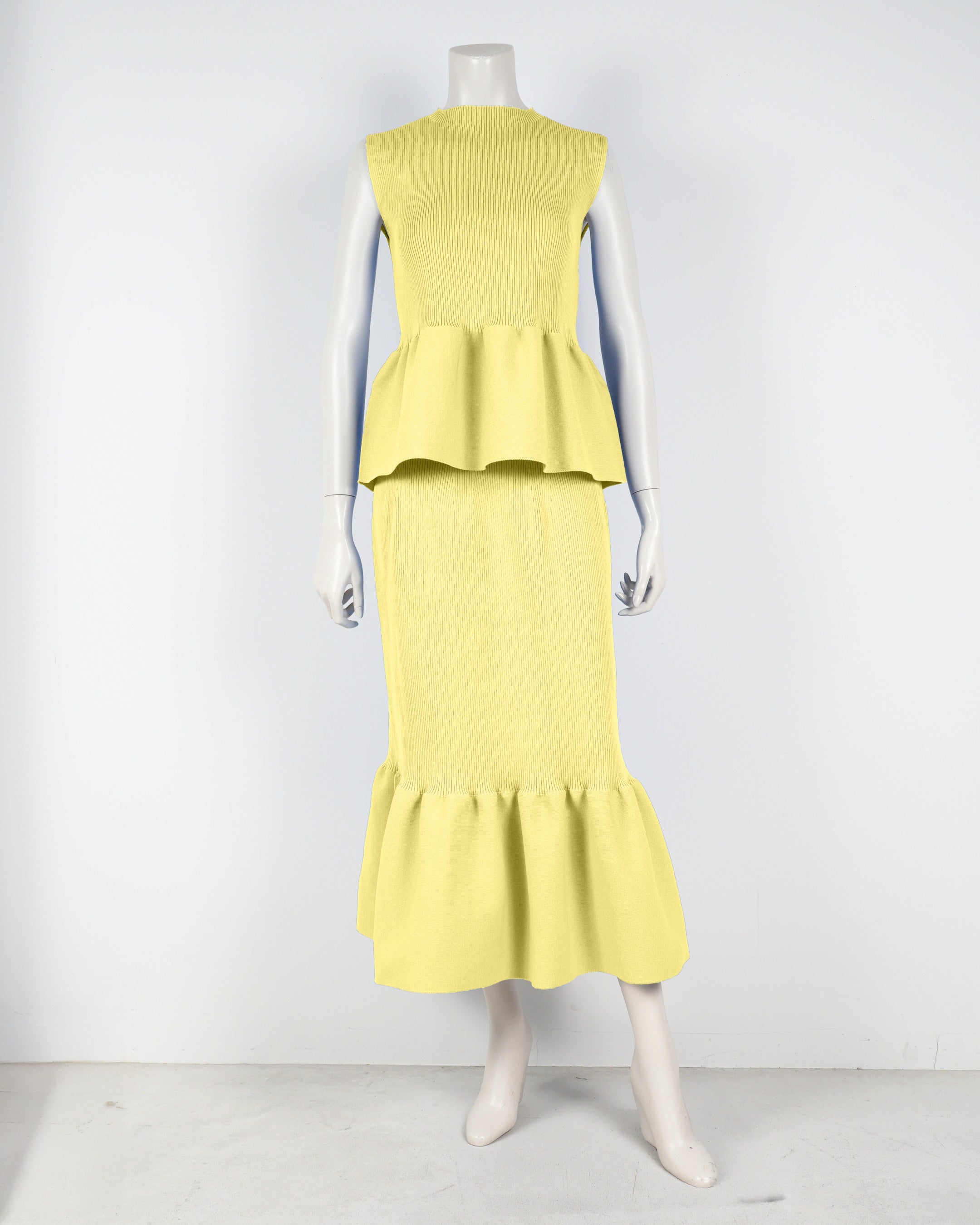 Sleeveless peplum pullover x mermaid skirt