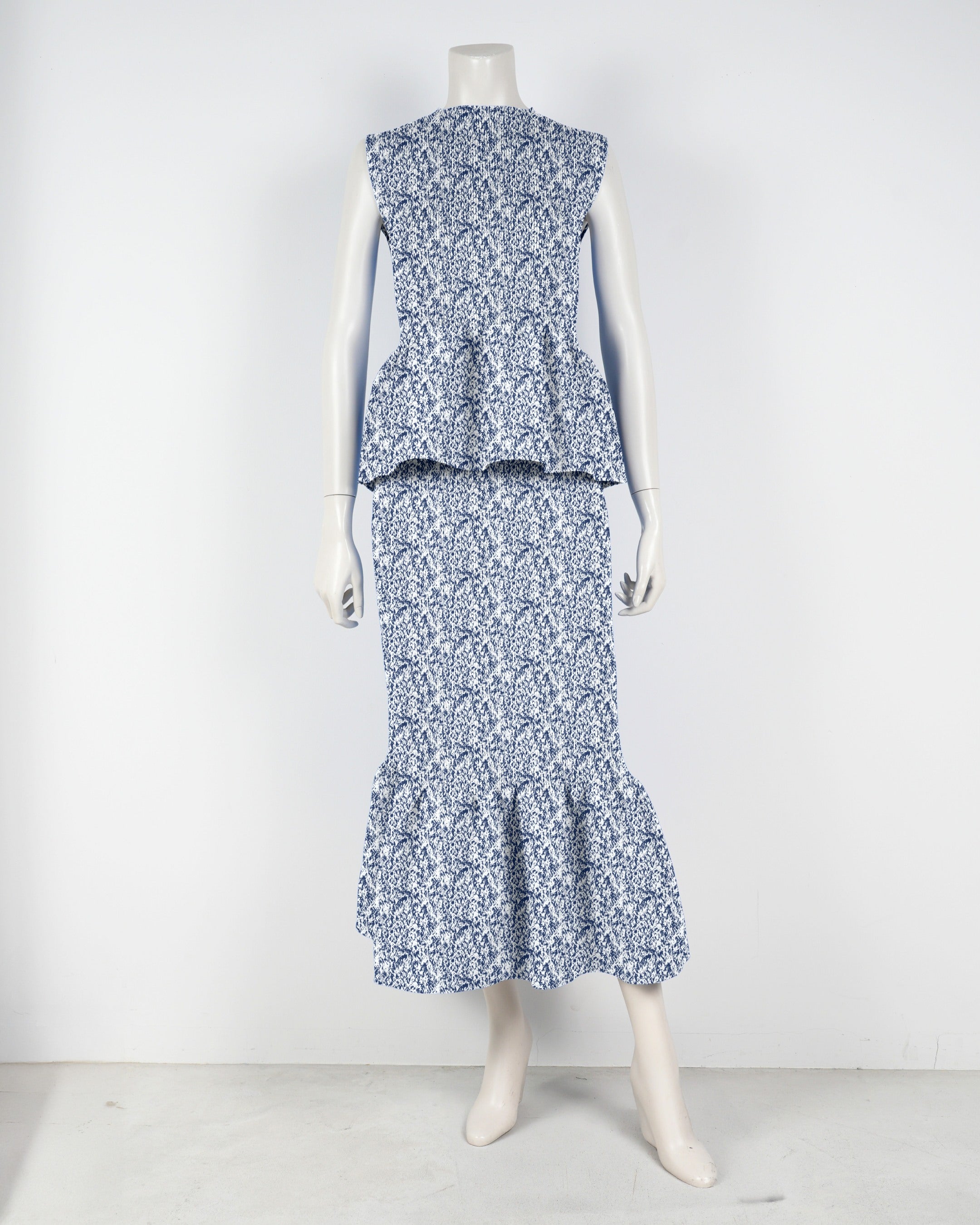 Sleeveless peplum pullover x mermaid skirt