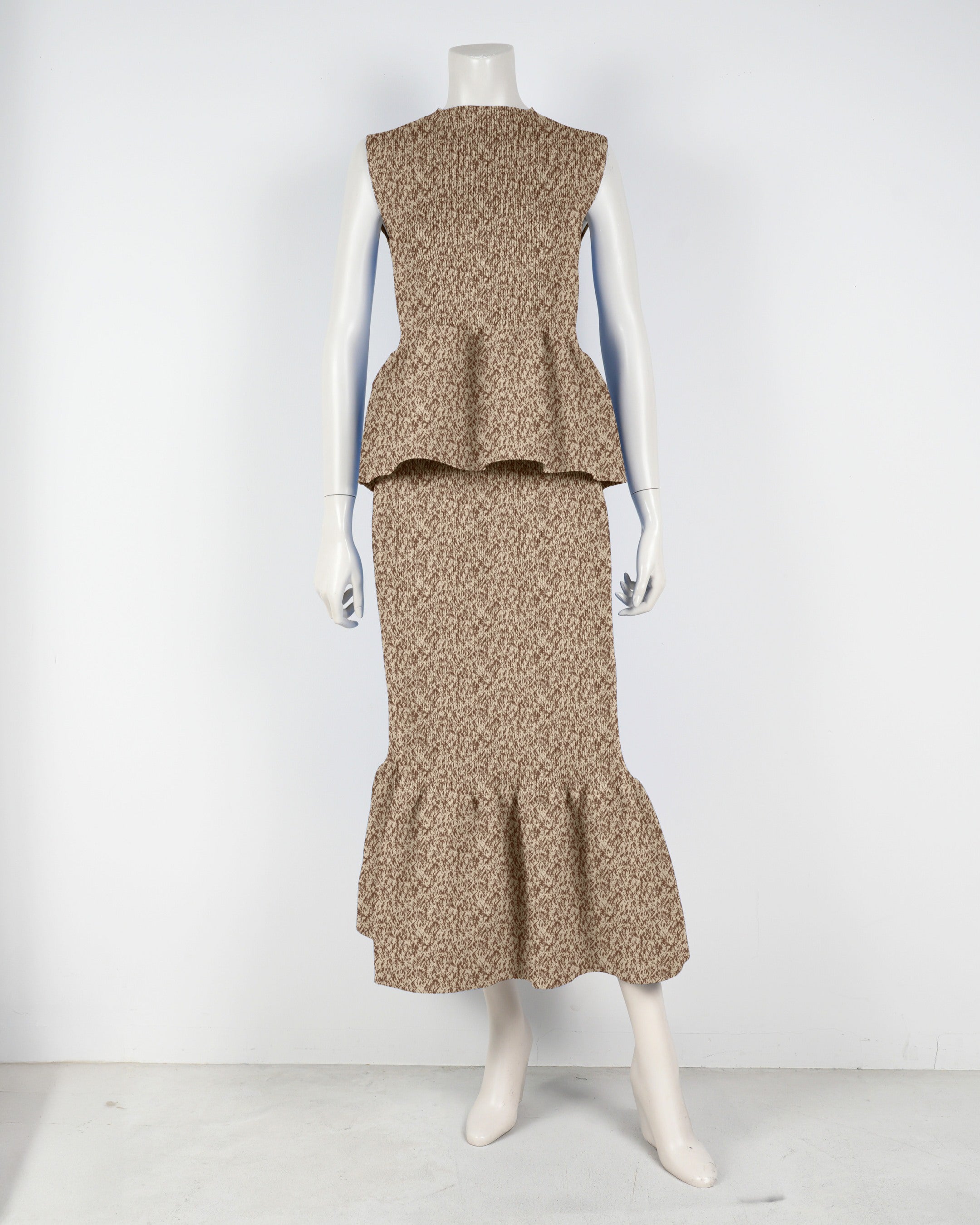 Sleeveless peplum pullover x mermaid skirt